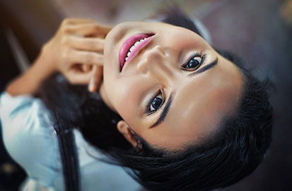 Young Woman Showing Bright Healthy Smile