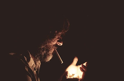 Person Smoking Cigarette